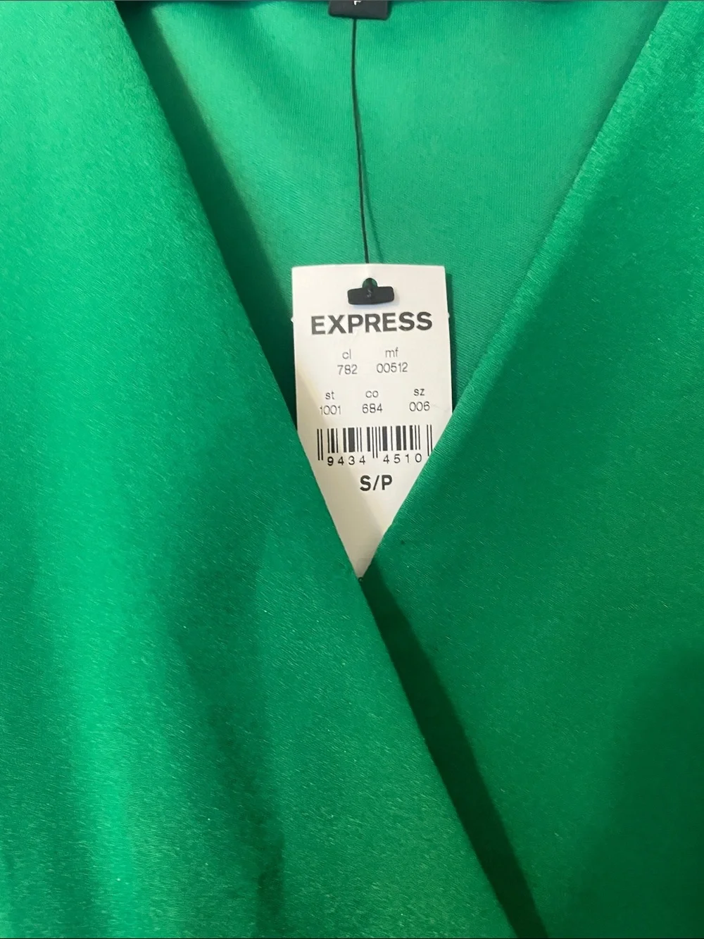 Express Green V-Neck Top with Cream Fitted Mini Skirt